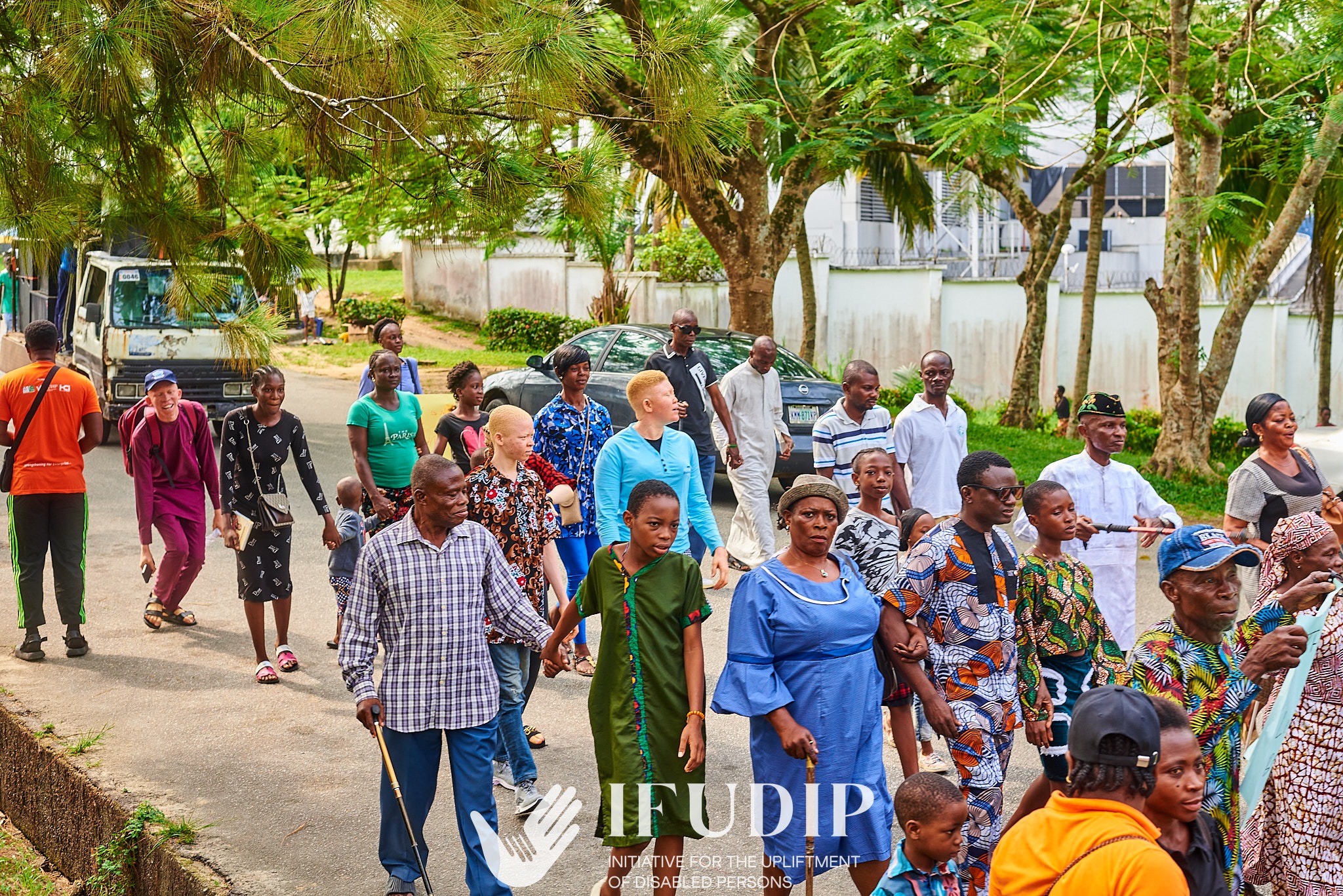 IFUDIP inclusive community walk featuring people with disabilities and families